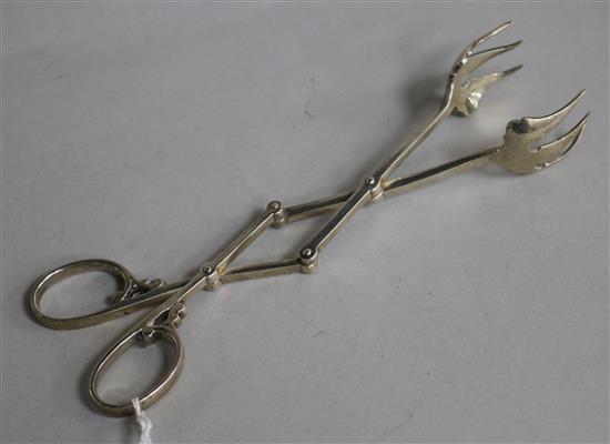 A pair of Cartier sterling silver ice tongs, signed and numbered 2232-1, 18.8cm.